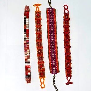 Set of 4 hand beaded bracelets in vivid red orange tones